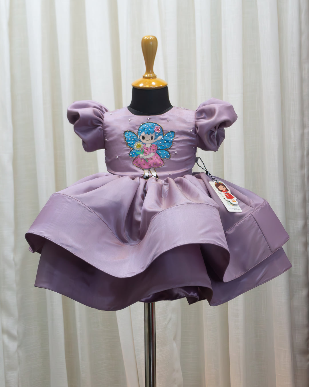Pastel lavender angel theme frock for baby girls, premium soft silk partywear birthday dress
Baby girls pastel lavender angel theme birthday dress in soft silk partywear frock
Pastel lavender partywear frock for girls, angel theme soft silk birthday dress