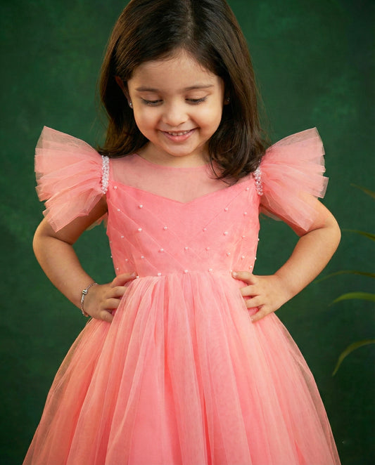 Peach pleated party frock side view baby girl – Stanwells Kids