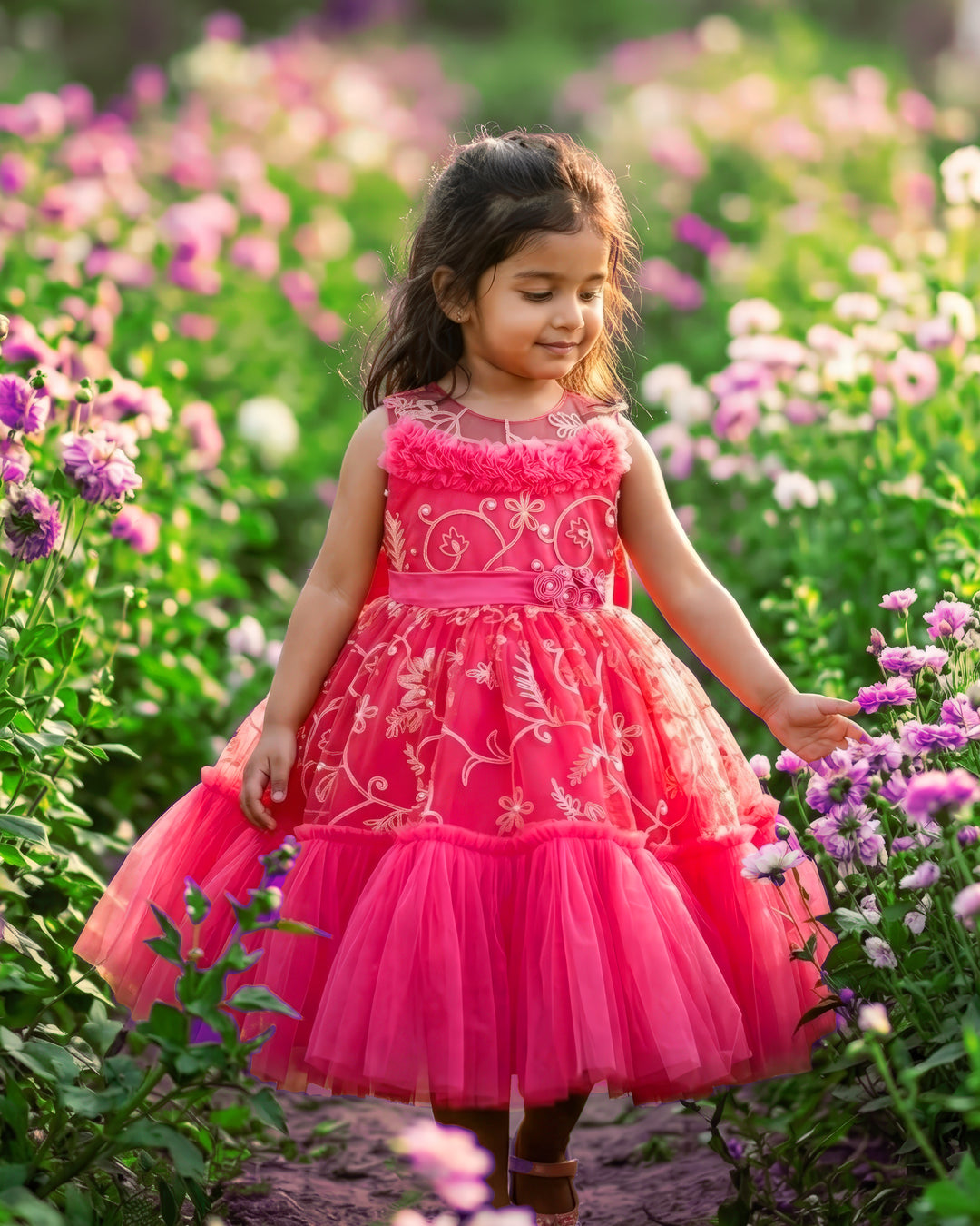 Peach Shade Thread Embroidery Ruffles Partywear Flower Frock
Material: Bright peach thread embroidery party wear flower frock is made with soft nylon net fabric. The yoke portion of the frock is fully completed in a ruffled p