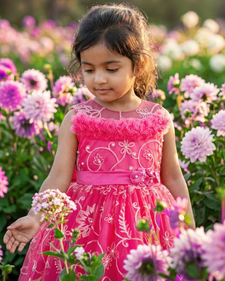 Peach Shade Thread Embroidery Ruffles Partywear Flower Frock
Material: Bright peach thread embroidery party wear flower frock is made with soft nylon net fabric. The yoke portion of the frock is fully completed in a ruffled p