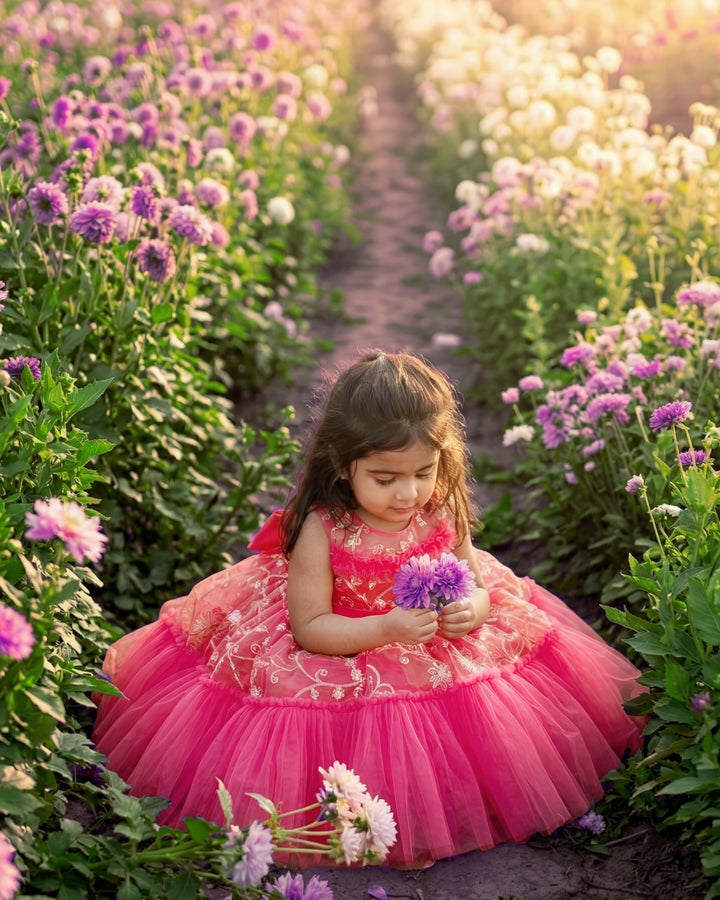 Peach Shade Thread Embroidery Ruffles Partywear Flower Frock
Material: Bright peach thread embroidery party wear flower frock is made with soft nylon net fabric. The yoke portion of the frock is fully completed in a ruffled p