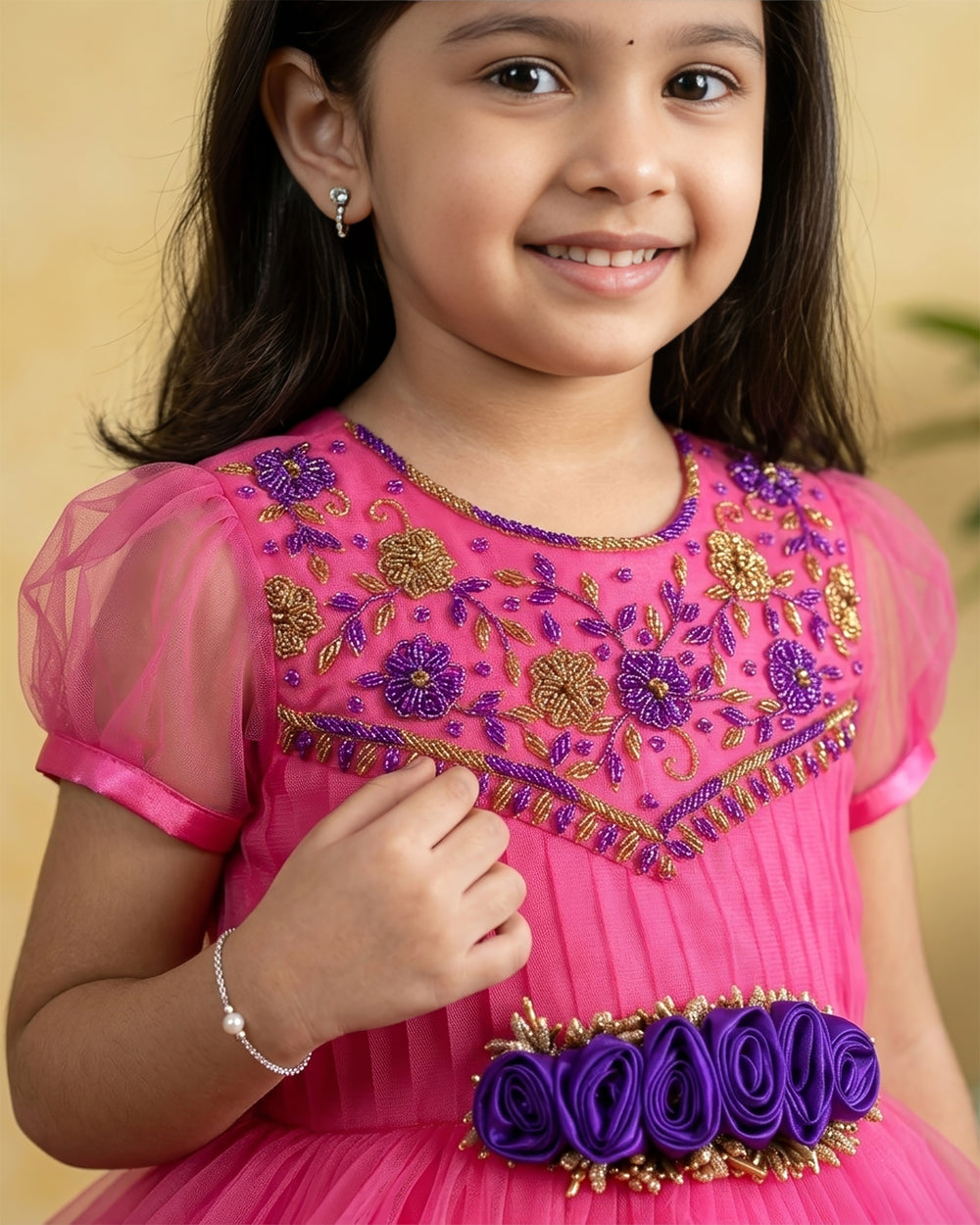 Peach & Violet combo Handwork Ruffles Party wear Frock
Material: Peach colour nylon net material is used as pleated design in the yoke portion with Heavy quality ultra satin as the primary lining .This satin lining give