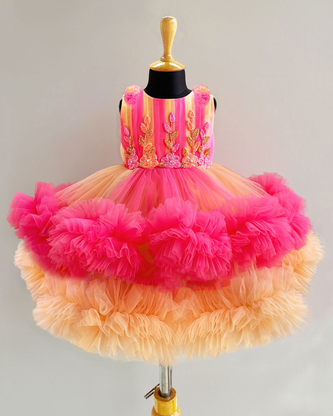 Blush and coral baby girl birthday dress with ruffles – party wear outfit for 1st birthday celebrations
