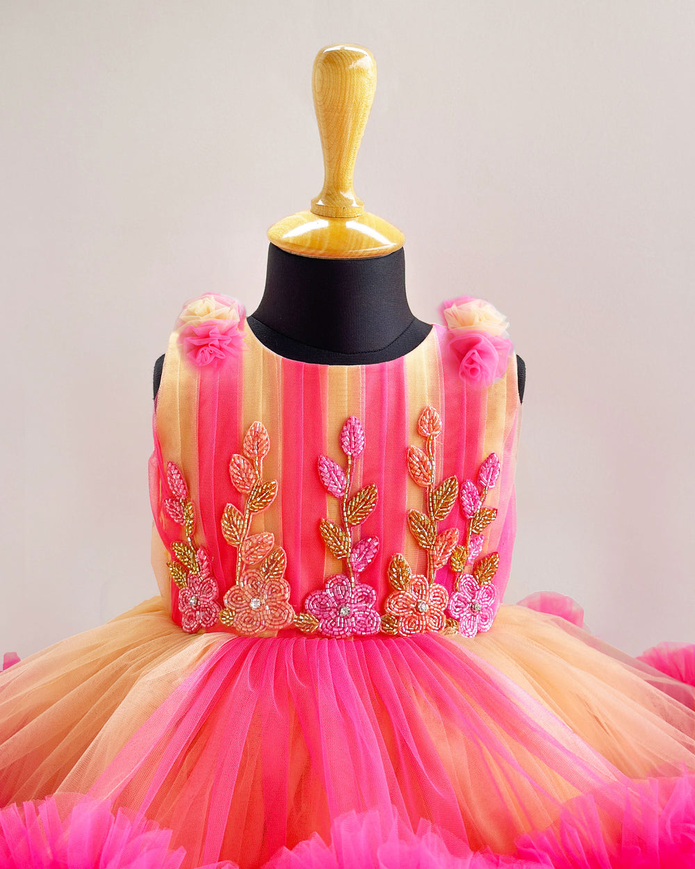 Blush and coral baby girl birthday dress with ruffles – party wear outfit for 1st birthday celebrations