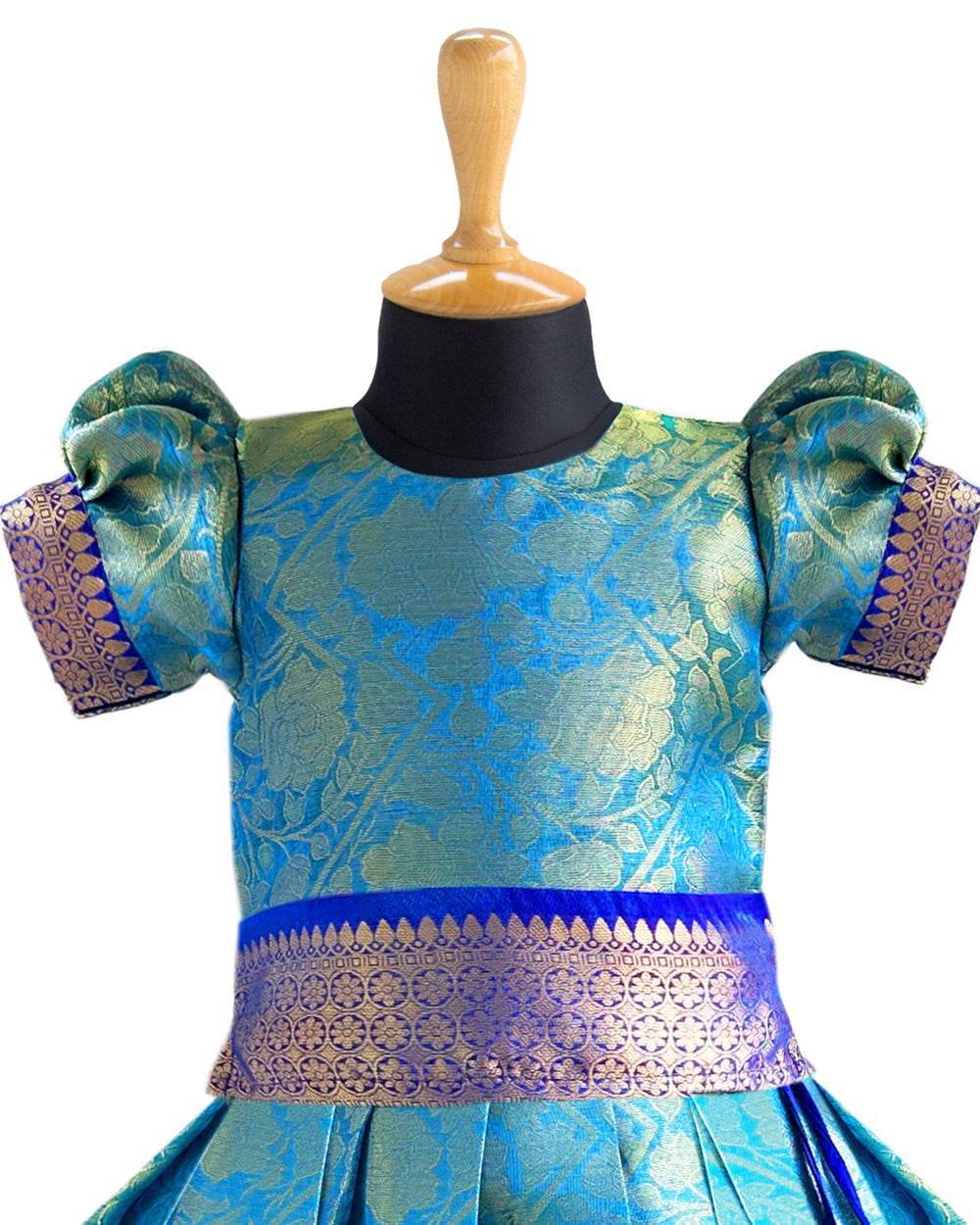 Peacock blue Banarasi silk lehenga choli for baby girls

Traditional puff sleeve dress for kids

Banarasi silk birthday dress for girls

Baby girls ethnic wear lehenga

Festive partywear dress for toddlers

Peacock blue traditional frock for baby girls

Stanwells Kids Banarasi birthday collection