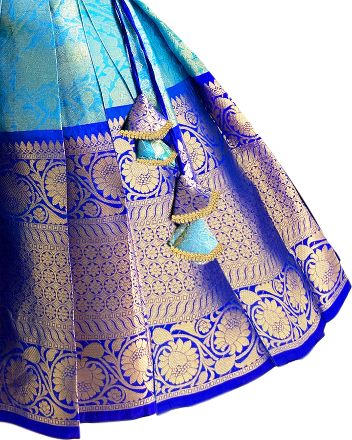 Peacock blue Banarasi silk lehenga choli for baby girls

Traditional puff sleeve dress for kids

Banarasi silk birthday dress for girls

Baby girls ethnic wear lehenga

Festive partywear dress for toddlers

Peacock blue traditional frock for baby girls

Stanwells Kids Banarasi birthday collection