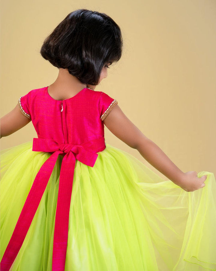 Lime Green & Pink Combo Partywear Hand Embroidery Long Gown
Material: Lime Green shade mono nylon softnet fabric is used for the bottom of the skirt. Rany pink blended silk fabric with heavily embroidery handwork on the neck