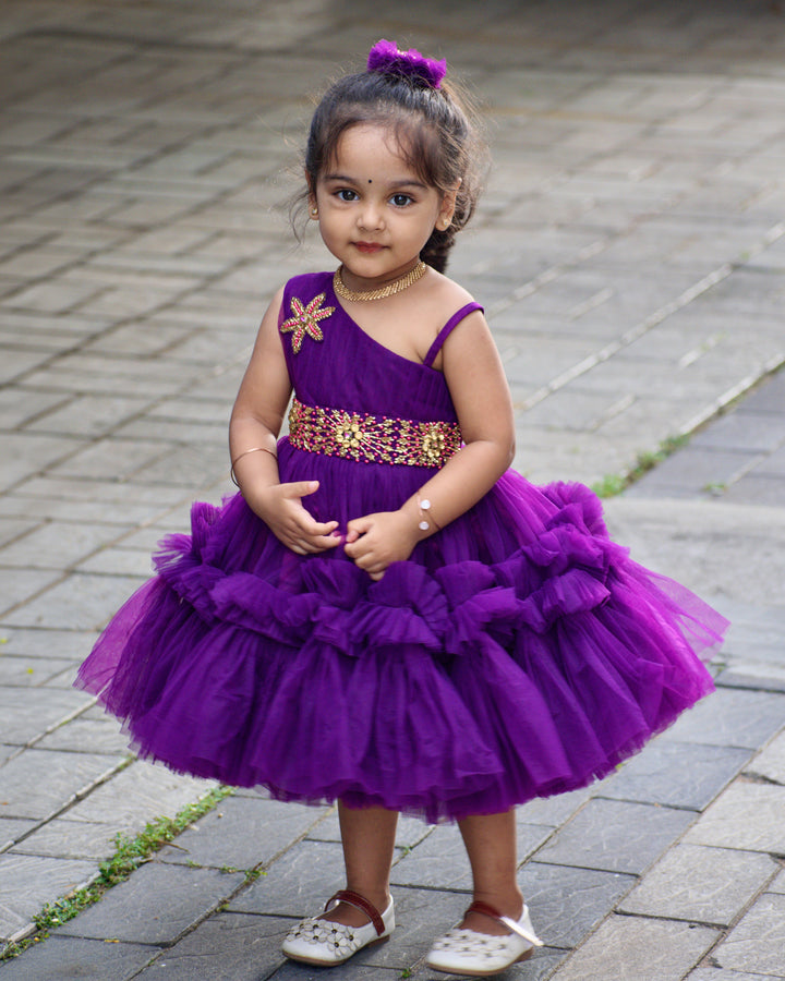Purple Shade Pleated Ruffled Frock
Material: Purple Shade Pleated Ruffled Frock mono net with layered and ruffles on the end portion. Yoke portion is designed with pleated pattern and a handwork in t