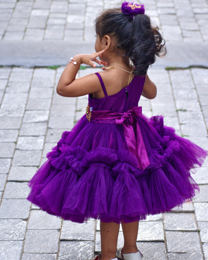 Purple Shade Pleated Ruffled Frock
Material: Purple Shade Pleated Ruffled Frock mono net with layered and ruffles on the end portion. Yoke portion is designed with pleated pattern and a handwork in t