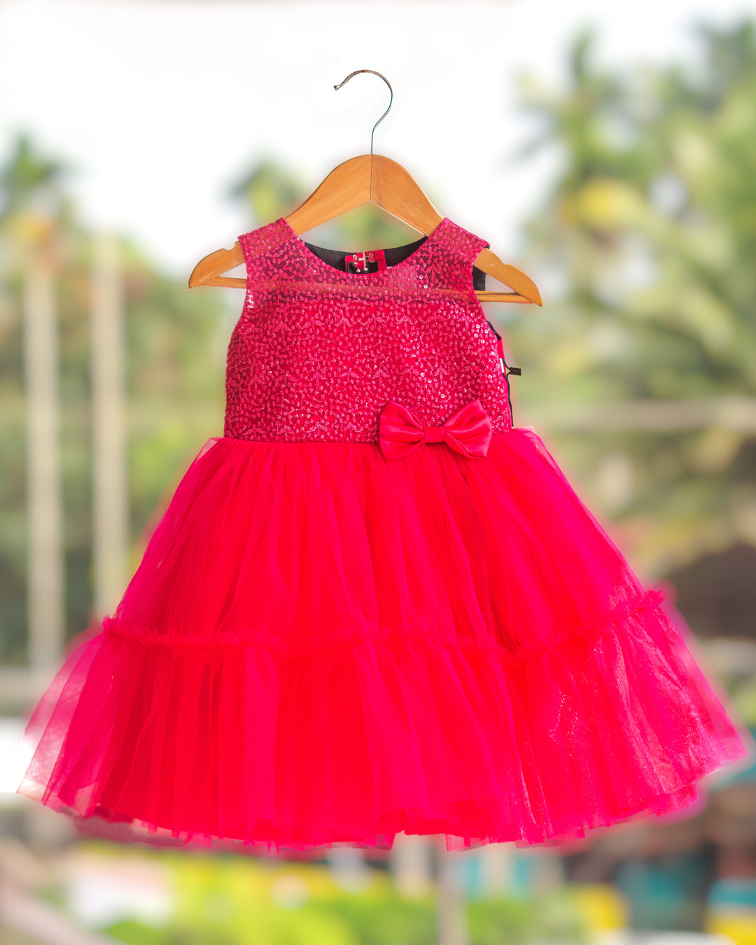 Rani pink embroidery ruffled birthday frock for baby girl – front view, Stanwells Kids