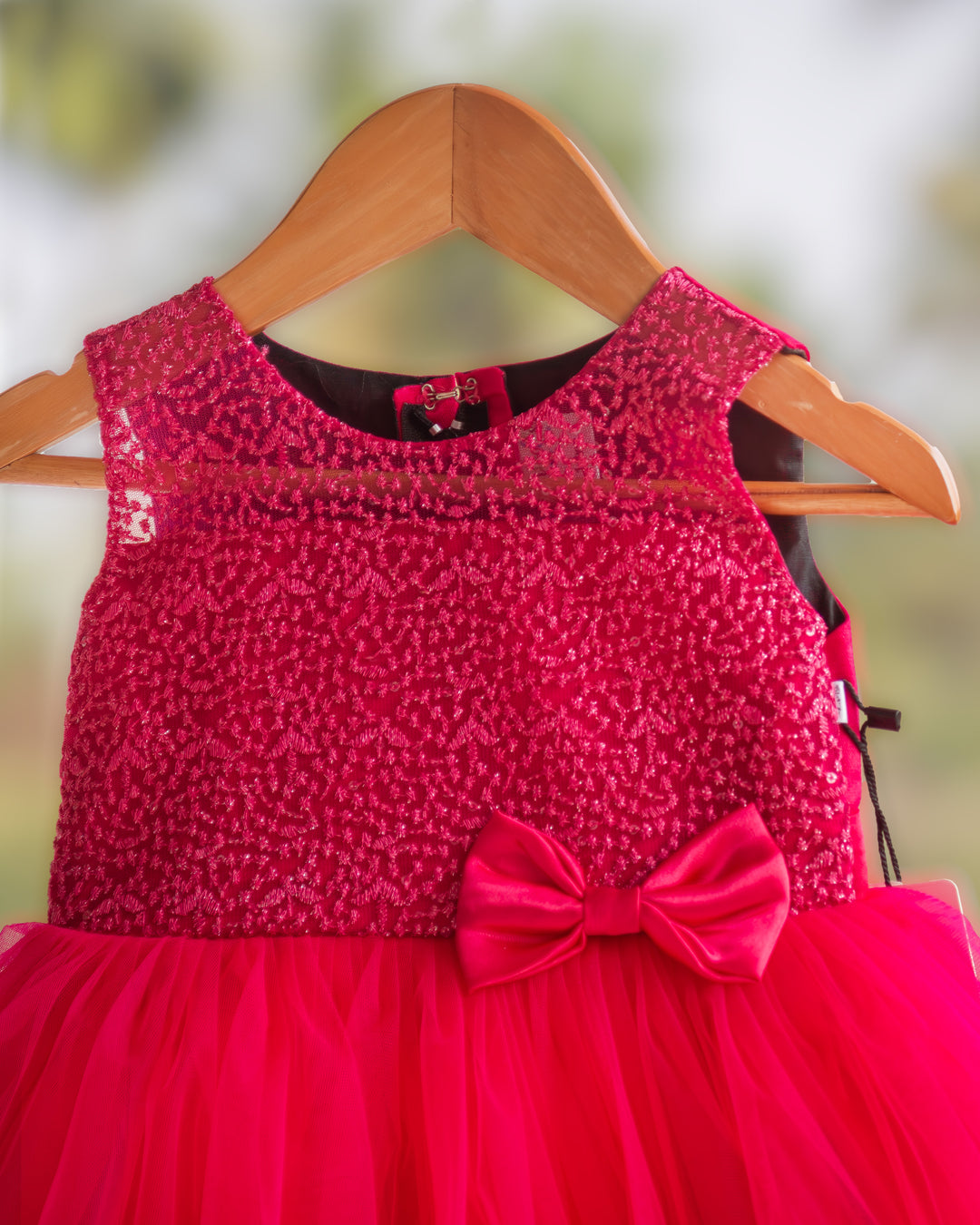Bow yoke embroidery detail on rani pink ruffled birthday frock – Stanwells Kids