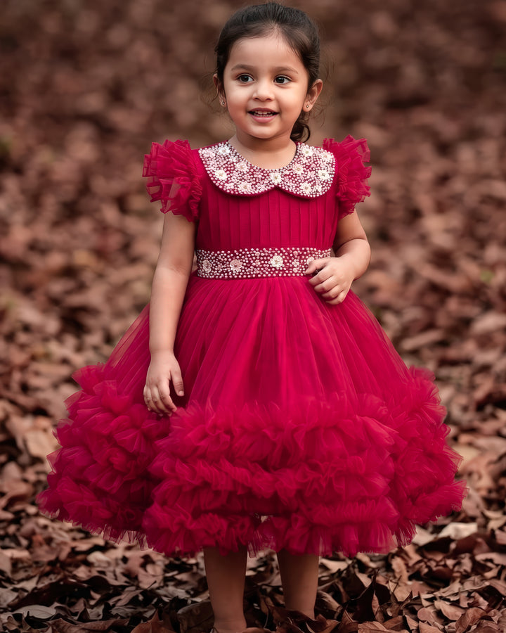 Rani pink birthday dress for baby girl with handwork

Baby girl partywear frock in rani pink shade

Peter collar pleated birthday dress for toddler girl

Rani pink baby girl frock satin lining back view

Handwork rani pink birthday dress close up detail

Baby girl first birthday partywear pink frock

Designer rani pink frock for baby girl celebration

Toddler girl birthday dress with pleated yoke