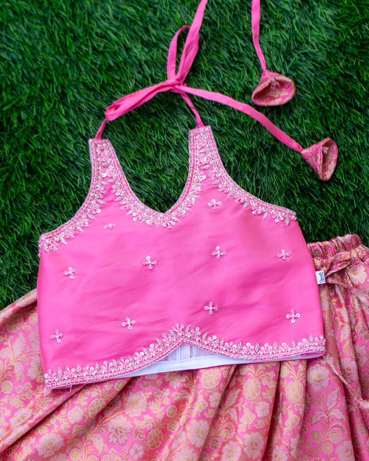 Golden handwork detail on rose pink Banarasi silk lehenga blouse – Stanwells Kids