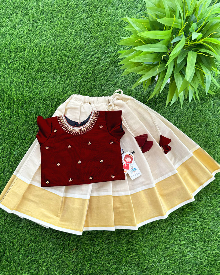 Baby girls birthday dress – golden and maroon Kerala Kasavu silk lehenga with handwork

