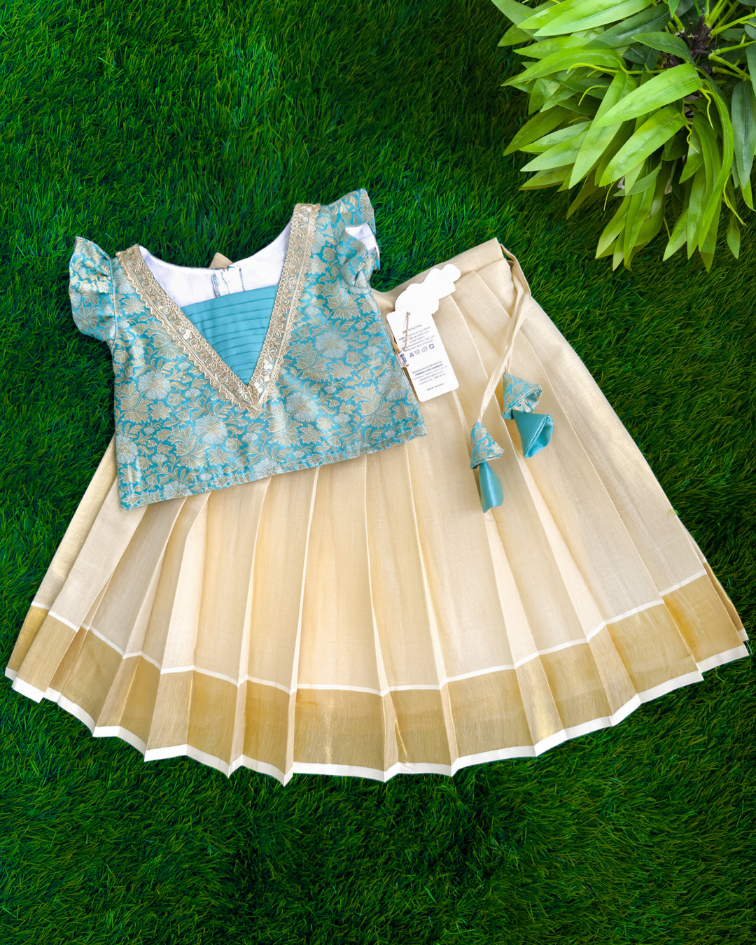 Sky blue brocade Onam special traditional lehenga choli for baby girl – front view, Stanwells Kids