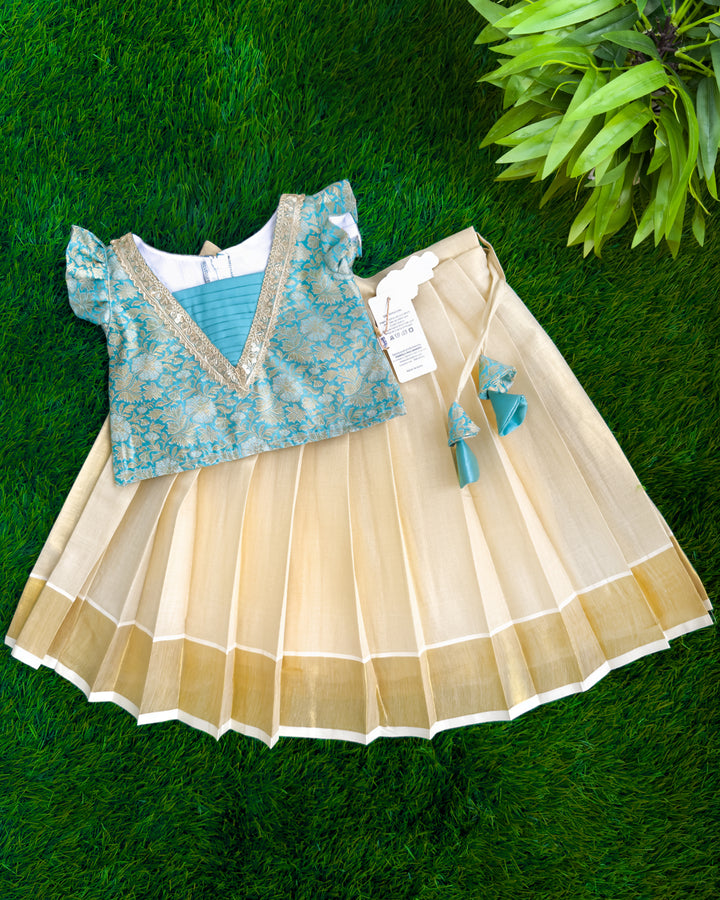 Sky blue brocade Onam special traditional lehenga choli for baby girl – front view, Stanwells Kids
