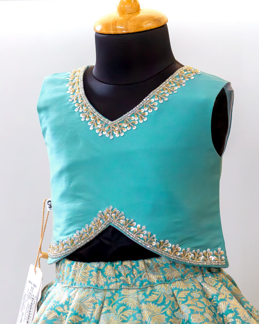 Golden handwork detail on sky blue Banarasi silk brocade lehenga blouse – Stanwells Kids