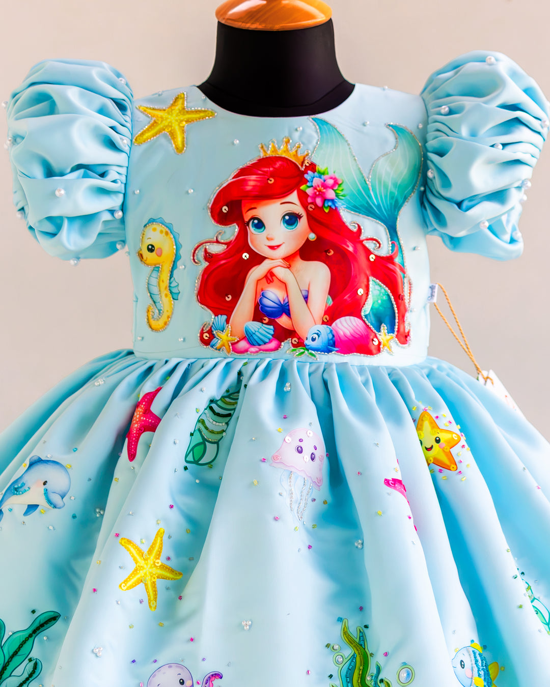 Mermaid theme handwork detailing on sky blue silky satin birthday frock – Stanwells Kids