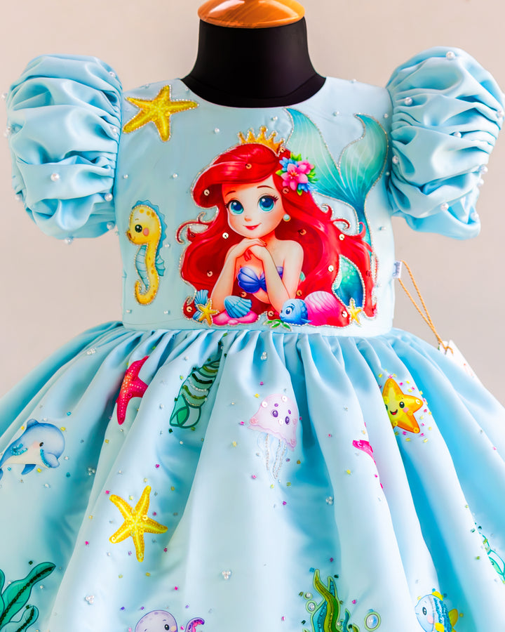 Mermaid theme handwork detailing on sky blue silky satin birthday frock – Stanwells Kids