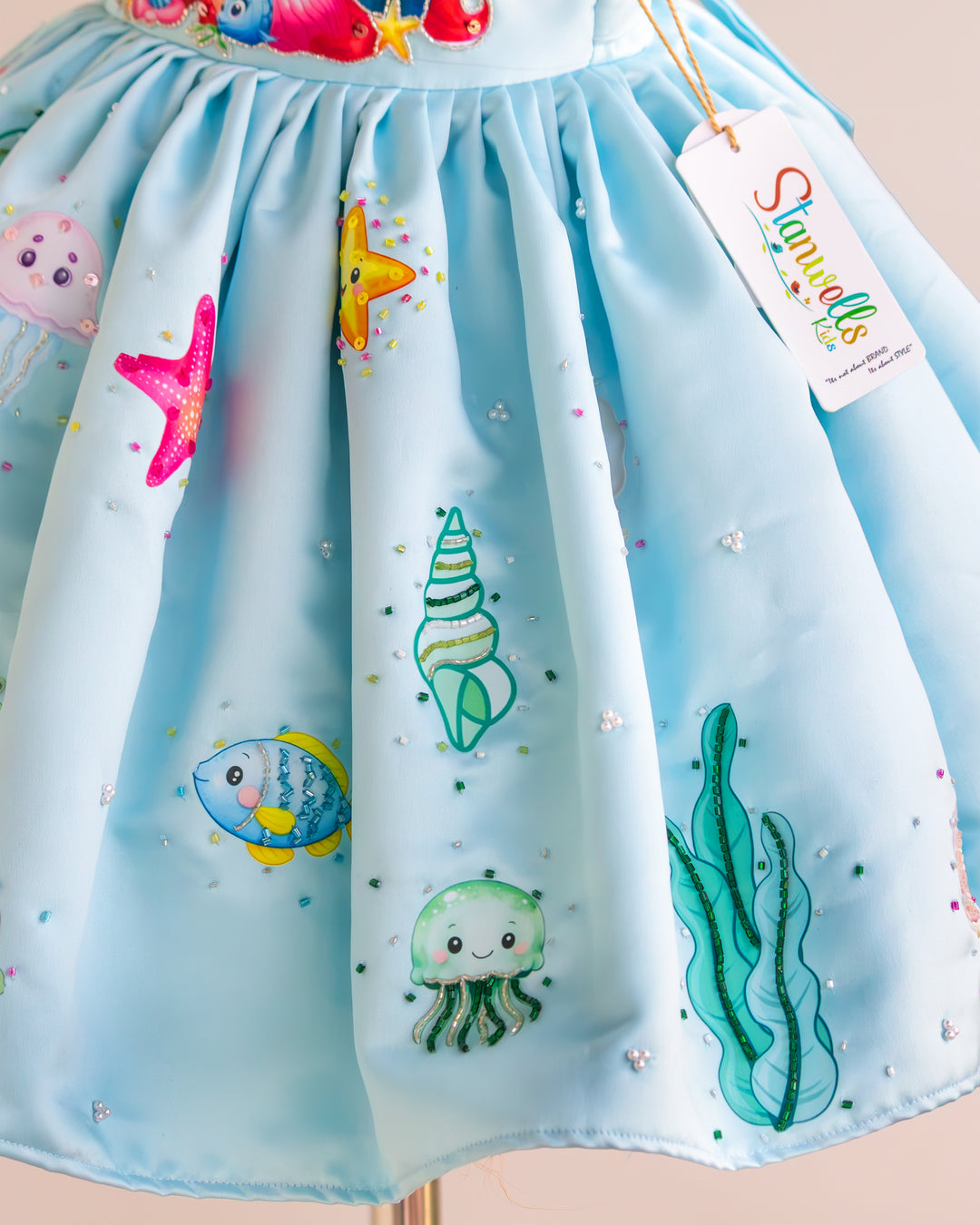 Back view of sky blue silky satin mermaid theme birthday frock – Stanwells Kids