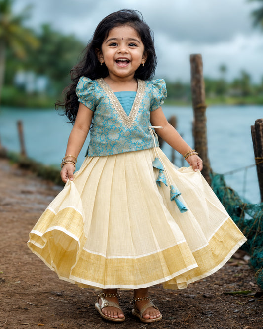 Sky blue brocade Onam special traditional lehenga choli for baby girl – front view, Stanwells Kids