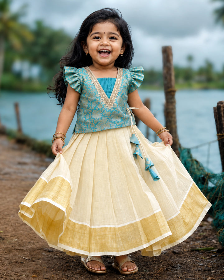 Sky blue brocade Onam special traditional lehenga choli for baby girl – front view, Stanwells Kids