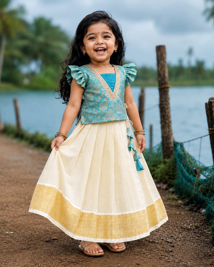 Sky blue brocade Onam special traditional lehenga choli for baby girl – front view, Stanwells Kids