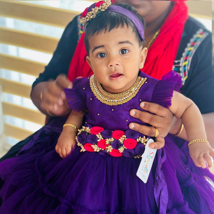 Purple shade Handwork Flower Frock
Material: Purple shade mono nylon net fabric with premium glossy satin as lining. Inner portion is covered with premium ultra satin and white cotton lining.

Colour