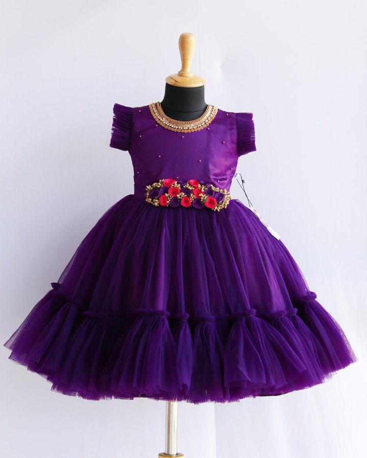 Purple shade Handwork Flower Frock
Material: Purple shade mono nylon net fabric with premium glossy satin as lining. Inner portion is covered with premium ultra satin and white cotton lining.

Colour
