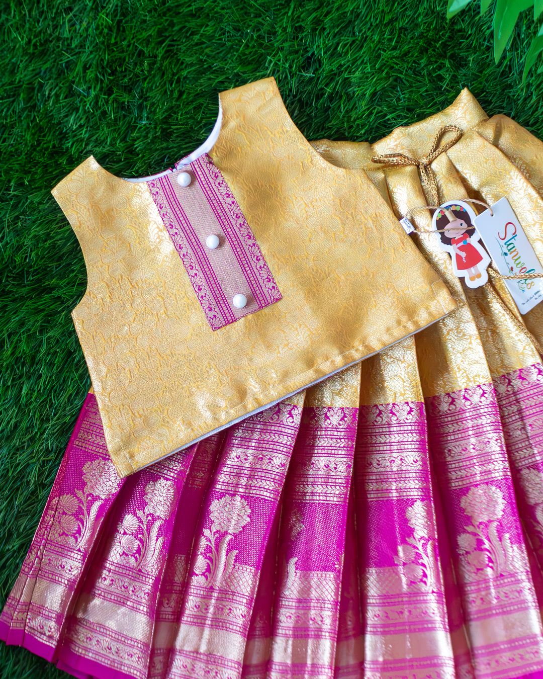 Golden handwork detail on magenta Banarasi silk lehenga blouse – Stanwells Kids