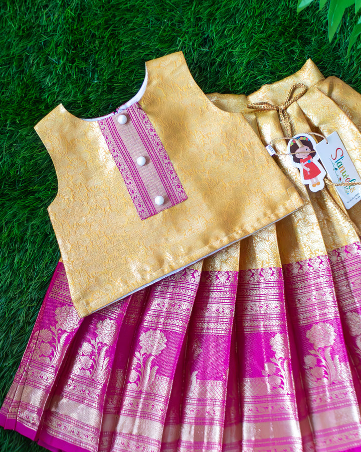 Golden handwork detail on magenta Banarasi silk lehenga blouse – Stanwells Kids