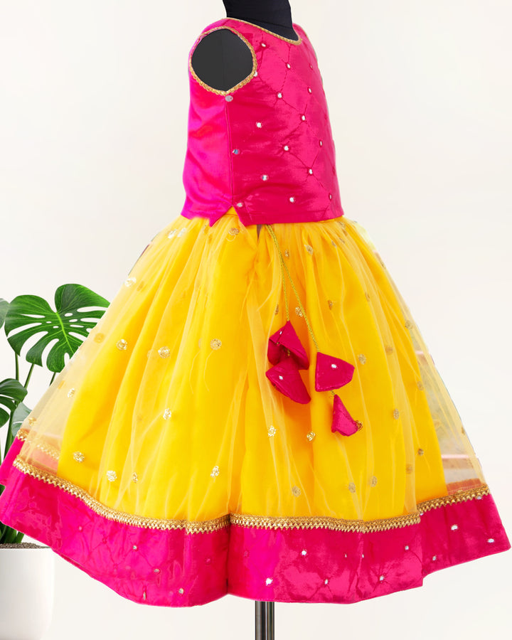 Yellow and magenta mirror work lehenga choli for baby girls

South Indian traditional birthday dress for girls

Mirror work festive wear lehenga choli

Baby girls ethnic partywear dress

Designer lehenga choli set for toddlers

Kids traditional outfit yellow magenta

Stanwells Kids festive birthday dress