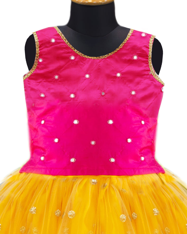 Yellow and magenta mirror work lehenga choli for baby girls

South Indian traditional birthday dress for girls

Mirror work festive wear lehenga choli

Baby girls ethnic partywear dress

Designer lehenga choli set for toddlers

Kids traditional outfit yellow magenta

Stanwells Kids festive birthday dress