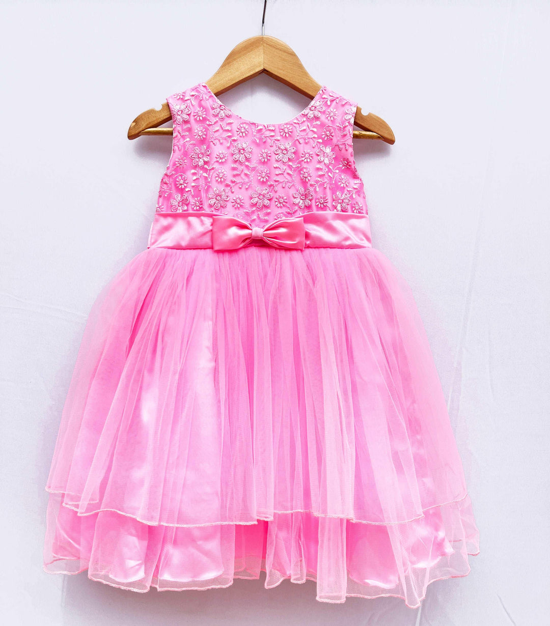 Baby Pink Designer Layered Frock
Fabric: Babypink mono net with premium same colour threadwork detailing on the yoke portion  Beautifully designed outfit for Baby girls with smooth lining for comfo