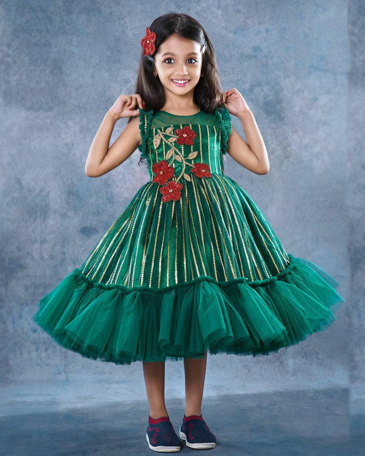 Bottle Green Designer Handwork Designer Flower Frock
Material: Bottle green colour Embroidery net frock with ruffled bottom. Heavy handwork red flower applique is given in the chest portion. Premium quality sequins wo