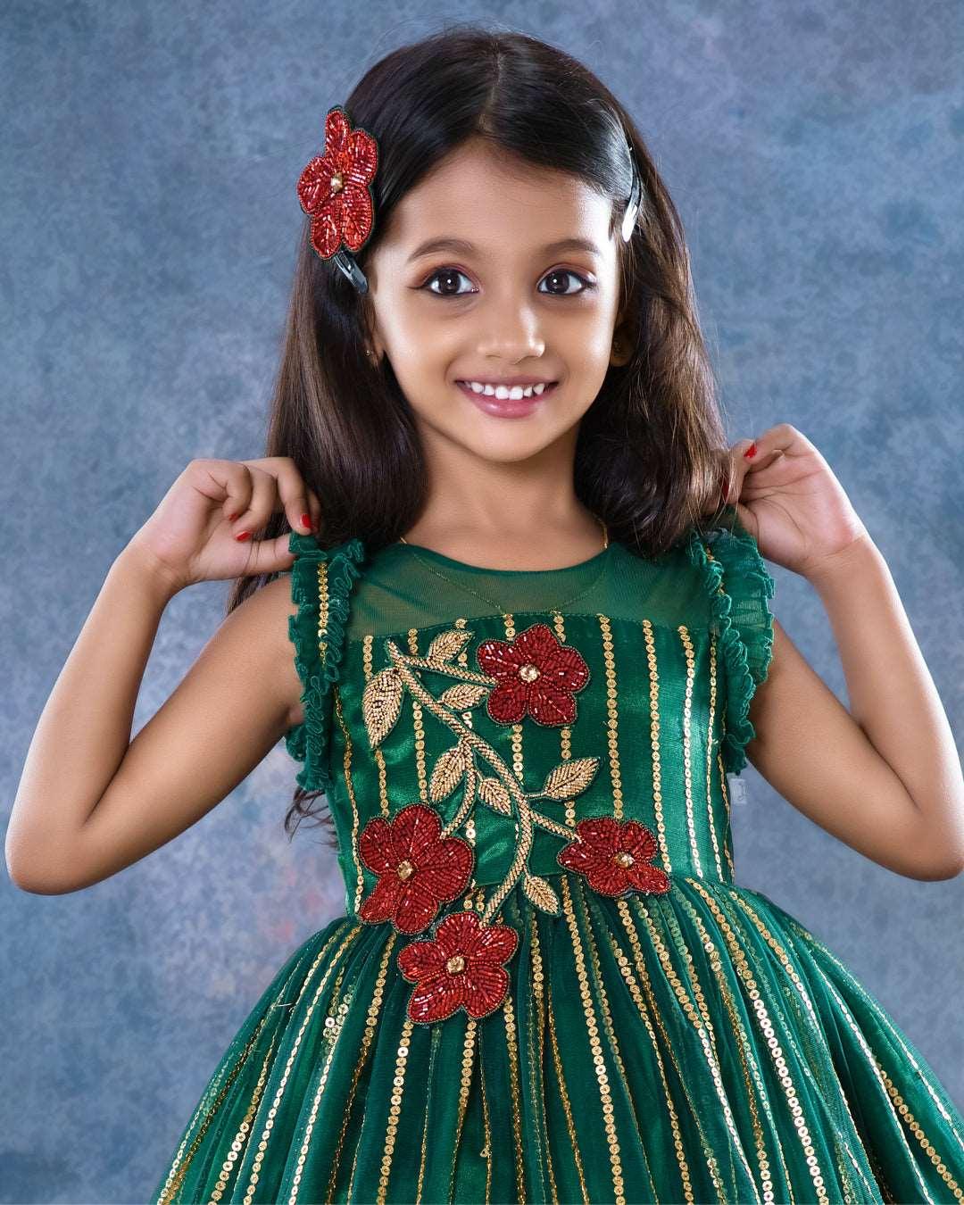 Bottle Green Designer Handwork Designer Flower Frock
Material: Bottle green colour Embroidery net frock with ruffled bottom. Heavy handwork red flower applique is given in the chest portion. Premium quality sequins wo