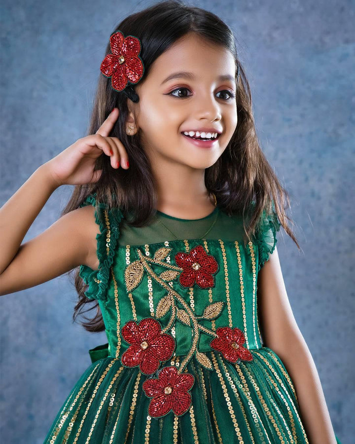 Bottle Green Designer Handwork Designer Flower Frock
Material: Bottle green colour Embroidery net frock with ruffled bottom. Heavy handwork red flower applique is given in the chest portion. Premium quality sequins wo