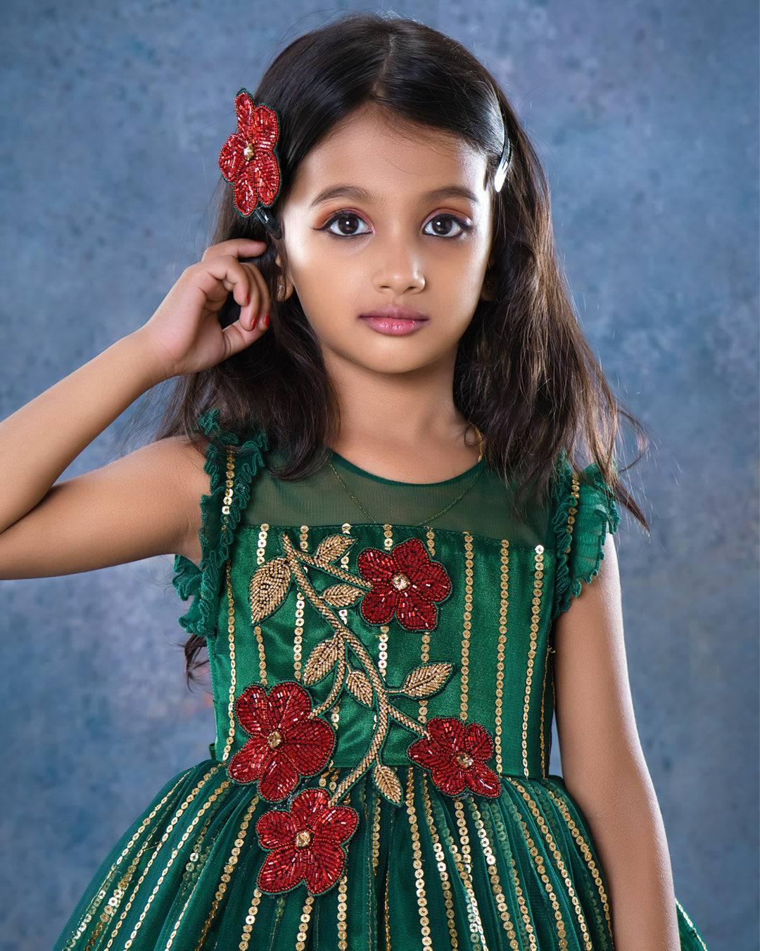 Bottle Green Designer Handwork Designer Flower Frock
Material: Bottle green colour Embroidery net frock with ruffled bottom. Heavy handwork red flower applique is given in the chest portion. Premium quality sequins wo
