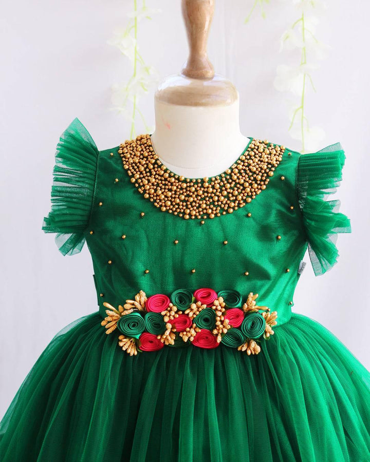 Bottle Green Shade Handwork Flower Frock
Material:  Bottle Green shade mono nylon net fabric with premium glossy satin as lining. Inner portion is covered with premium ultra satin and white cotton lining. 