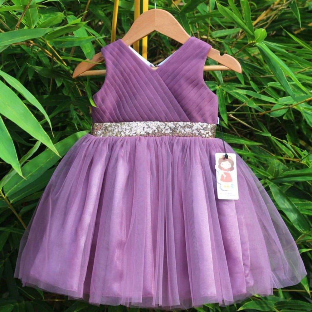 Pastel Lavender Pleated Knee Length Frock
Material: Pastel lavender soft mono nylon net with pleated yoke design. Centre portion has a detailing of a sequins belt. Inside portion of the frock is fully cover