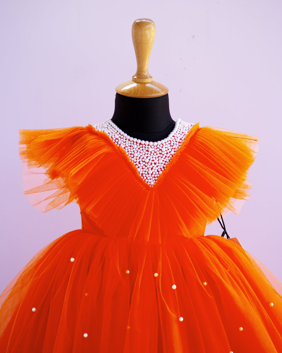 stanwells kids, orange frock, pearl work frock for kids, beads work frock, ruffles sleeves frocks, handwork frock for kids, liandli, nakshtarakids, janyas closet