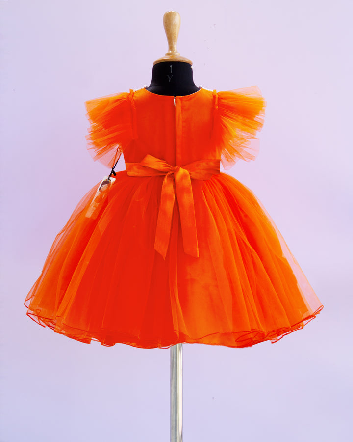 stanwells kids, orange frock, pearl work frock for kids, beads work frock, ruffles sleeves frocks, handwork frock for kids, liandli, nakshtarakids, janyas closet