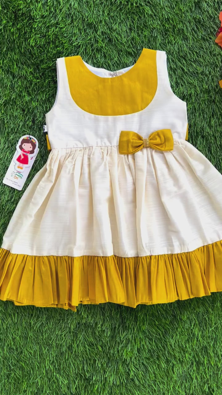 Cream & Gold Shade Kerala Traditional Ruffles Bow Frock