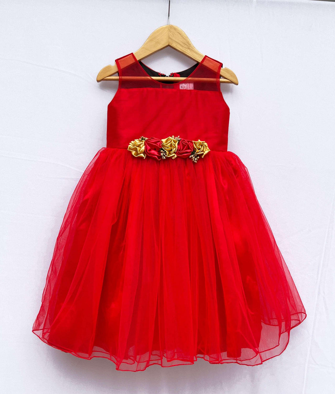 Red Colour Designer Flower Frock
Fabric:  Red shade  mono net with green and golden mix flowers on the centre portion.  Neck is designed in Transparent pattern. Beautifully designed outfit for Baby