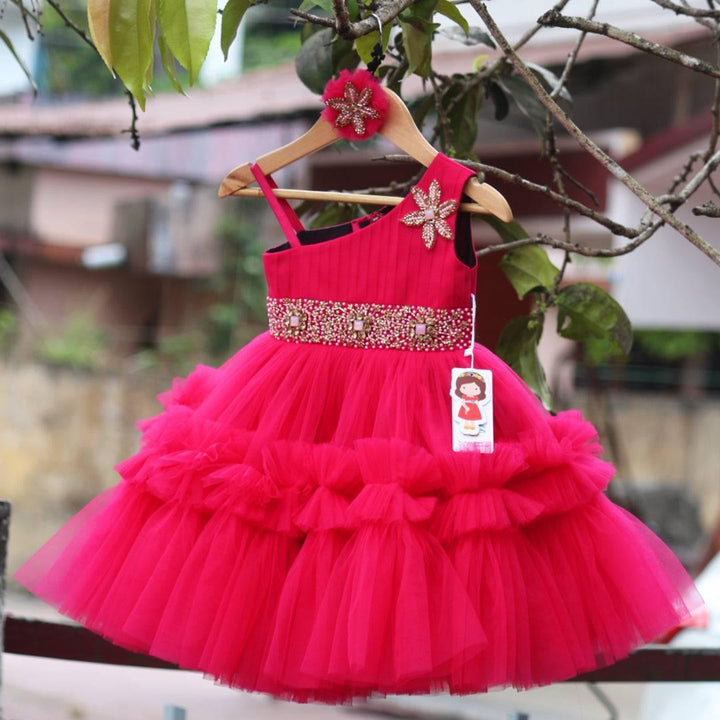 Ranypink Shade Pleated Handworked Ruffled Frock
Material:  Ranypink Shade Pleated Ruffled Frock is made with mono net with layered and ruffles on the end portion. Yoke portion is designed with pleated pattern and