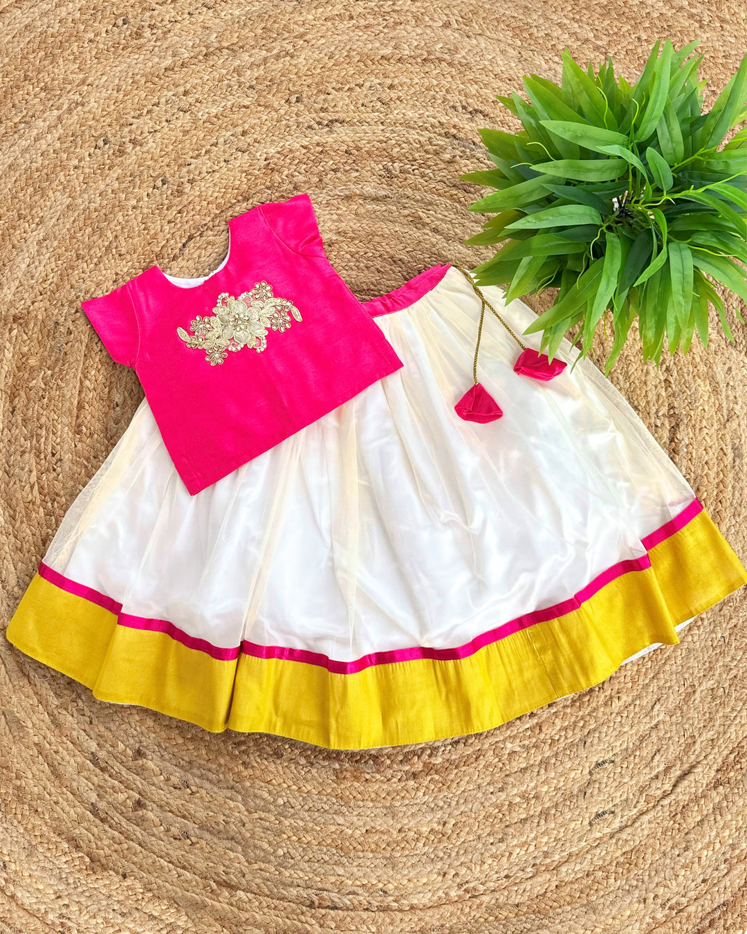 Kerala traditional lehenga choli for baby girl

cream pink birthday lehenga for kids

baby girls Kerala festive dress

ethnic lehenga choli for toddlers

Stanwells Kids Kerala lehenga outfit