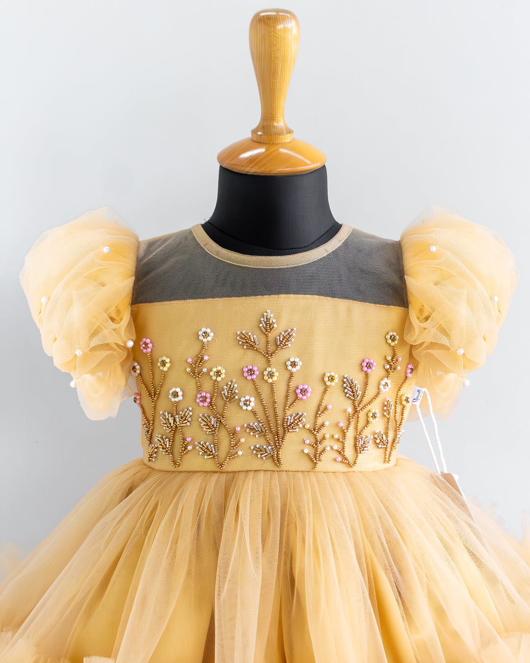 Stanwells Kids golden party wear ruffles frock for girls handwork dress