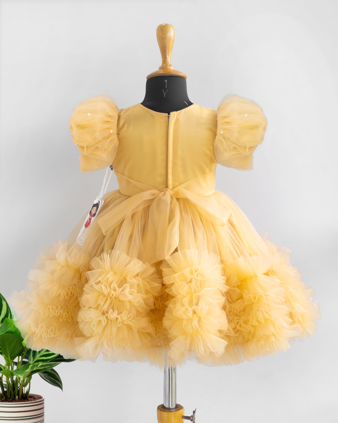 Stanwells Kids golden party wear ruffles frock for girls handwork dress