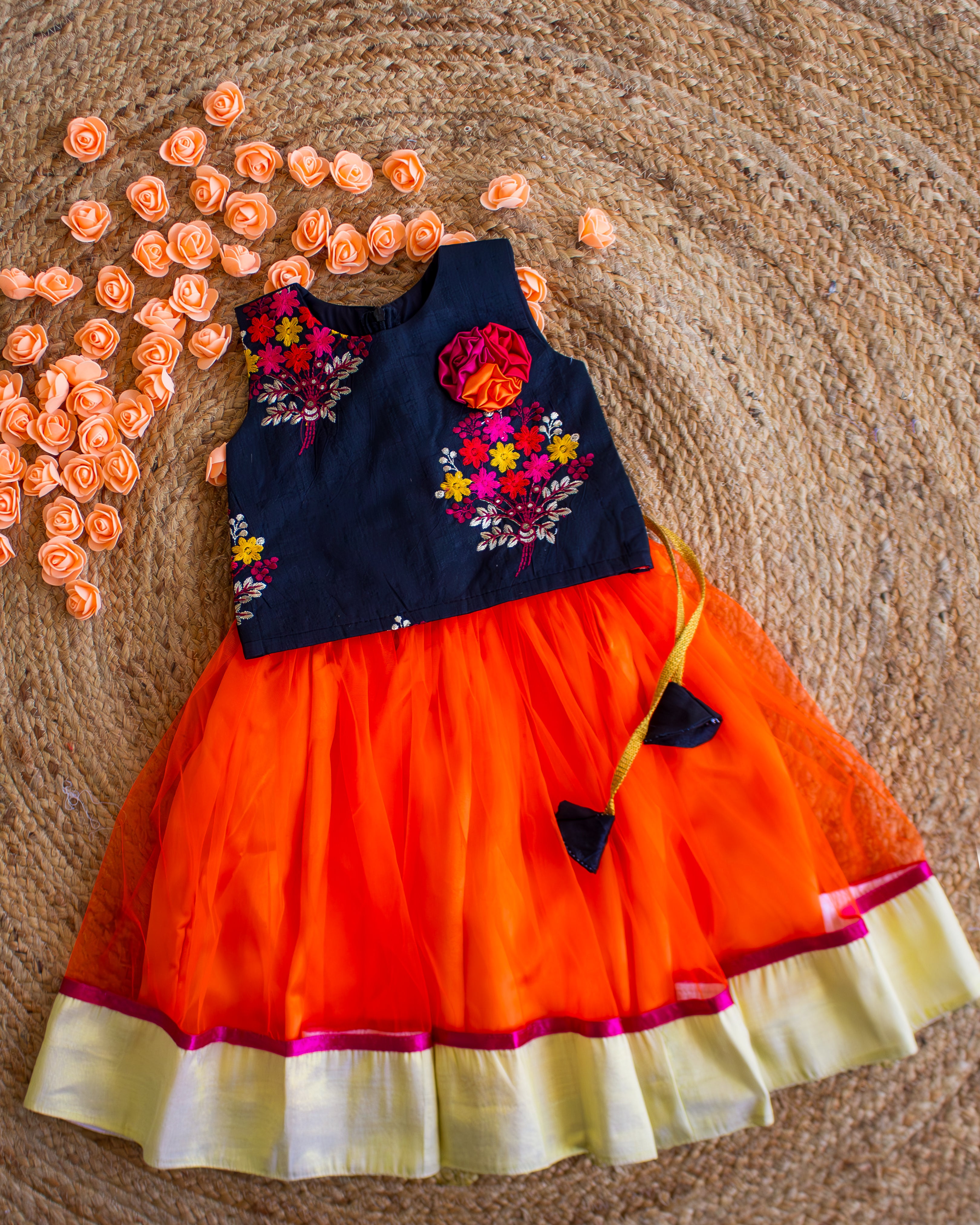 Orange and black combo lehenga choli set for baby girls

Traditional birthday dress for girls

Baby girls festive wear lehenga

Stylish ethnic dress for toddlers

Black orange designer lehenga for baby girls

Kids partywear traditional dress

Stanwells Kids ethnic birthday outfit