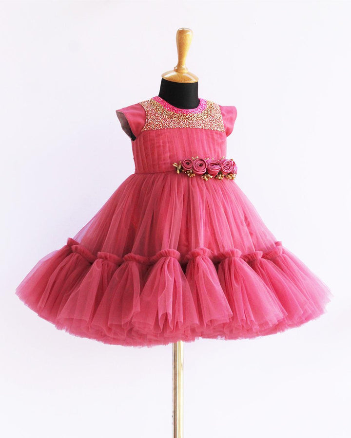 Blush Pink colour Hand embroidery Ruffles Birthday Flower Frock
Material : Blush Pink colour nylon net material is used in the skirt portion with Heavy quality ultra satin as the primary lining .This satin lining give the glossy